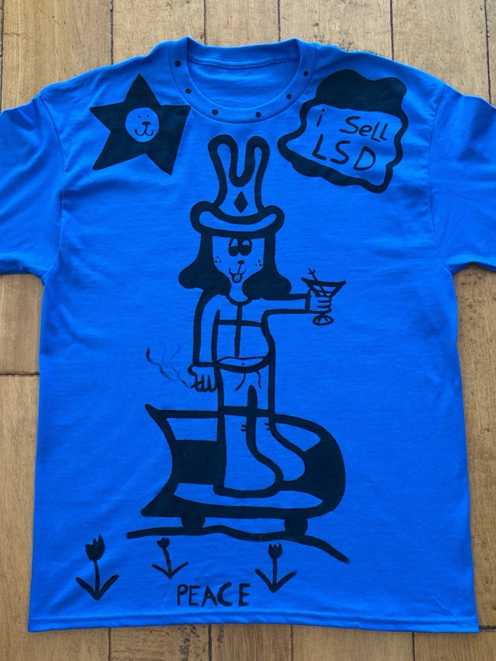 Blue Graphic Tee with Black Cartoon Design